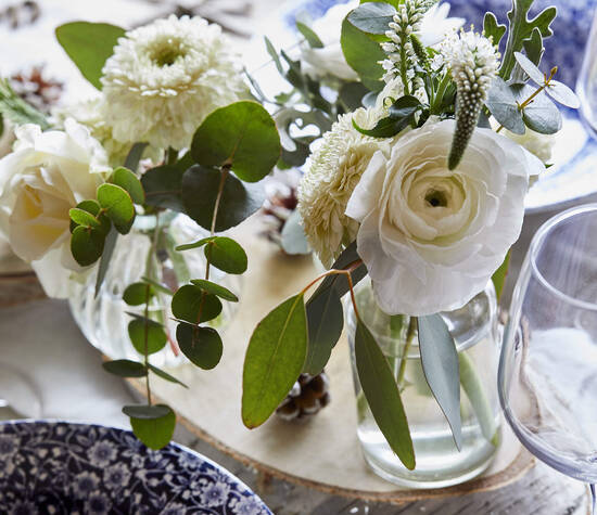 Le bouquet fleuri sur votre table de mariage